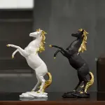 Sculpture en résine de cheval noir doré et argenté